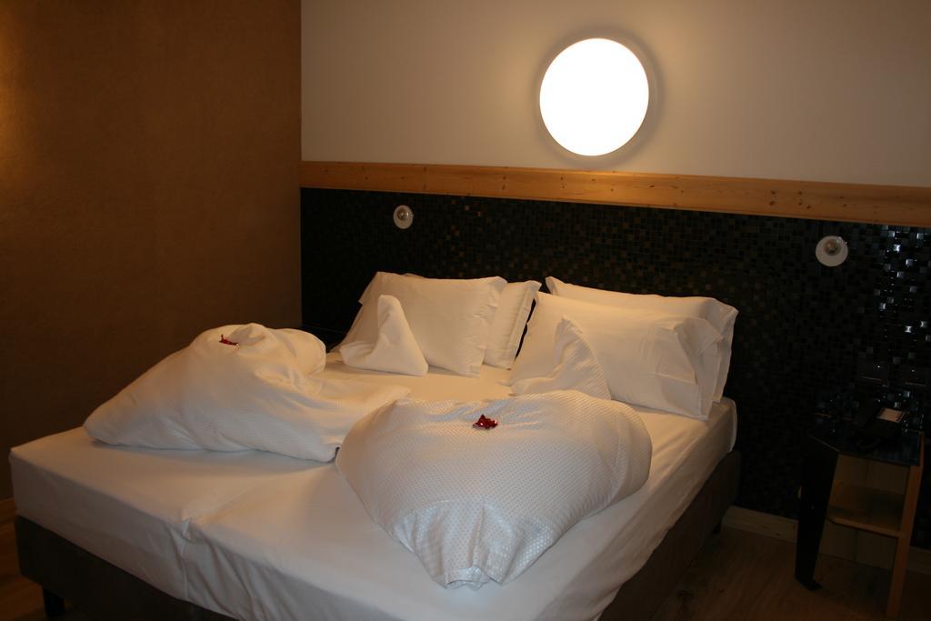 Hotel Orso Grigio Cavalese Quarto foto
